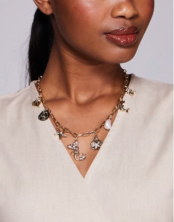 mermaid shell charm necklace in gold