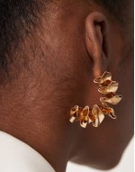 hoop earrings with folded petal detail in gold tone
