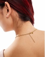 cross charm necklace in gold