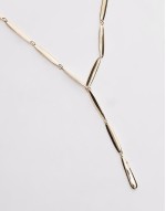 Nelia statement lariat necklace in gold tone