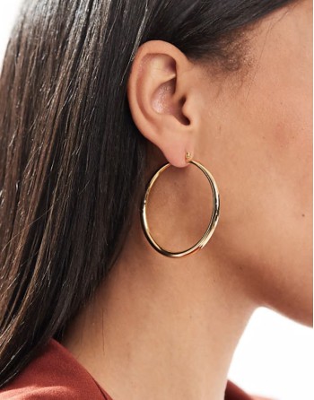 14k gold plated earrings with graduated skinny hoop detail