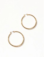 14k gold plated earrings with graduated skinny hoop detail
