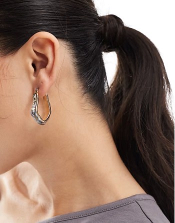 hoop earrings with molten clear enamel detail in gold tone